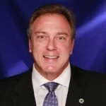 Dr. Aaron ReichPresident AISD School Board