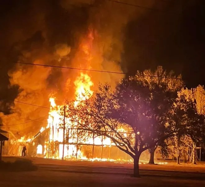 Blue Fire house burning image