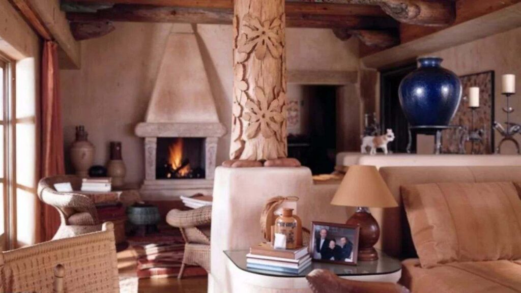 gene hackman's Cozy Master bedroom with Adobe-Fireplace