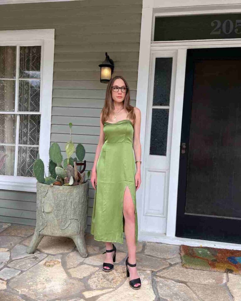 kat timpf infront of her luxurious house